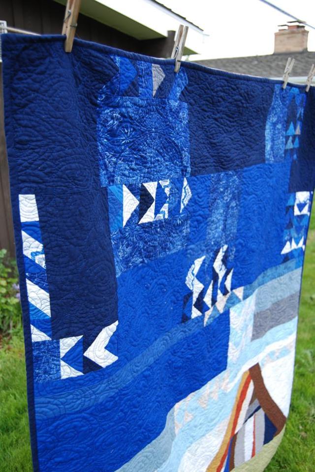 Abstract mountain and flying geese quilt